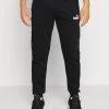 Puma Tape - Tracksuit Bottoms - Black -Fashion clothing 20d6a1bd9fa04ade9f3ceb90d66b3e88