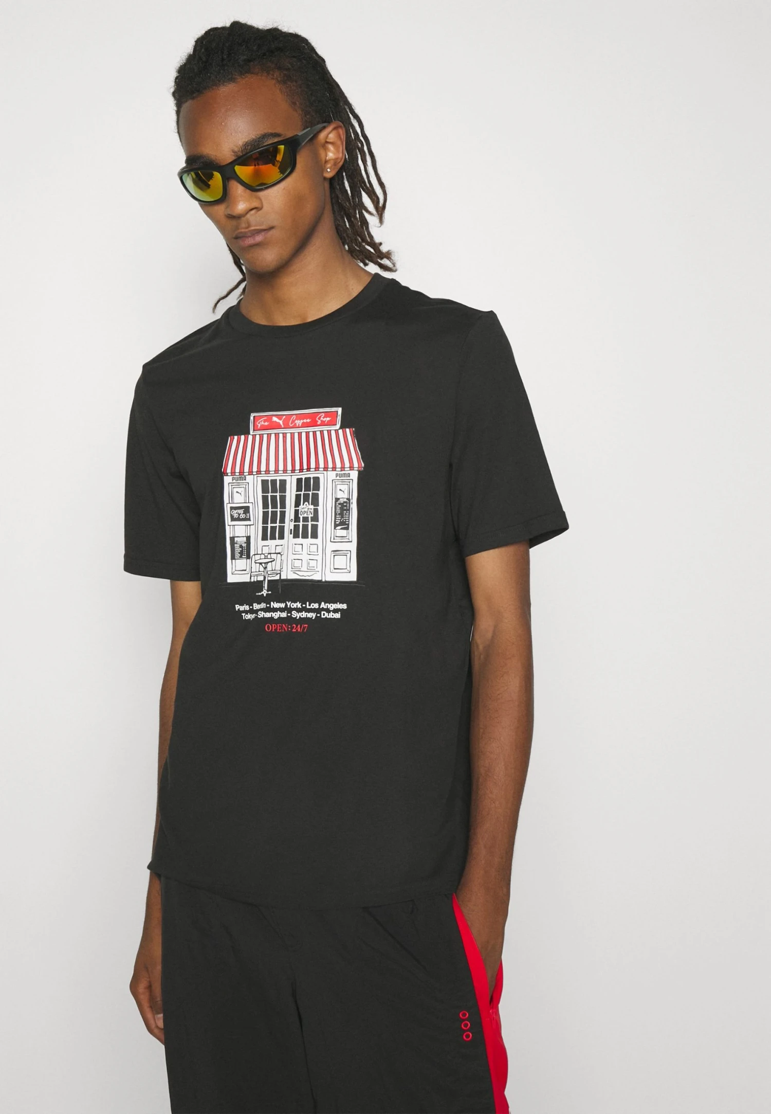 Puma Graphics Café Tee - Print T-Shirt - Black 8 Puma Graphics Café Tee - Print T-Shirt - Black - Image 6