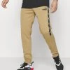 Puma Tape - Tracksuit Bottoms - Toasted -Fashion clothing 2909a3aa5bd24fff8c329a05b728e76f