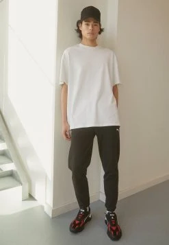 Puma Tracksuit Bottoms - Black -Fashion clothing 2e4b7a4f32704a1d82cb9e7f3ca54e24