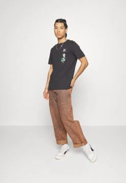 Puma Classics Super Graphic Tee - Print T-Shirt - Black -Fashion clothing 38b842d271364ea9821639c7e068432e