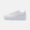 Puma Carina Street Jr - Trainers - White/Gold