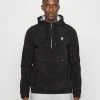 PUMA Golf Paradise Anorak Jacket - Light Jacket - Puma Black -Fashion clothing 46f9ce1e7a654491927d4206b60f3bf0