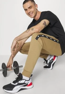 Puma Tape - Tracksuit Bottoms - Toasted -Fashion clothing 496b5d7784784f4987898ee0b67e6729