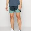 Puma First Mile - Sports Shorts - Dark Night/Adriatic -Fashion clothing 4c5afa34b48d411994bb6918eaa77b97