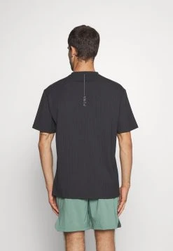 Puma Studio Unwind Tee - Sports T-Shirt - Black -Fashion clothing 624b55df74e24b479b99a37890f6560a