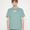 Puma Downtown Logo Tee - Print T-Shirt - Adriatic -Fashion clothing 636daa25b7c547268fc29170b04b0500