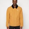 Puma Downtown Padded Coach Jacket - Light Jacket - Desert Tan -Fashion clothing 6d8a864fe6bf499488a8e1ffb483ba01