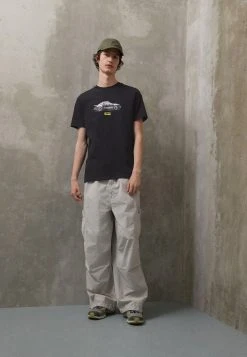 Pl Graphic - Print T-Shirt - Puma Black -Fashion clothing 88a537f730014bd8aa7314c16708278b