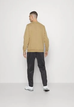 Puma Ess Small Logo Crew Fl S - Sweatshirt - Toasted -Fashion clothing 8a839b823dea4e8d84cc1ca19ffbd8ae