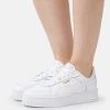Puma Carina Street - Trainers - White/Gold -Fashion clothing 9a9c2f5f90d8454e8e3bfa75f5a09220