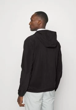 PUMA Golf Paradise Anorak Jacket - Light Jacket - Puma Black -Fashion clothing a1c0998b2f8544e7b5525721fd104239