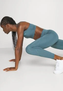 Puma Pamela Reif Strap Bra - Light Support Sports Bra - Green -Fashion clothing a8fa4c814c9b48a8873354c2ba477221