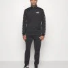 Puma Tape Suit - Tracksuit - Black 1 Puma Tape Suit - Tracksuit - Black -Fashion clothing b1d8c077dad6424a80c1bf6349e2b1f6