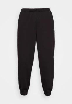Puma Relaxed - Tracksuit Bottoms - Black -Fashion clothing b28f7b88f1934d9696eca29a21aee614