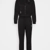 Puma Train Favorites Tracksuit - Tracksuit - Black -Fashion clothing bbb16831d30f43a388b1e349deffc96f