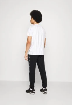 Puma Tape - Tracksuit Bottoms - Black -Fashion clothing bfe3d1e35ae847ca8e9783365e3b5d5e