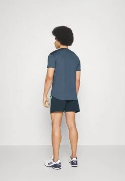 Puma First Mile - Sports Shorts - Dark Night/Adriatic -Fashion clothing cdfc01d56e974863b1c64129382345f7