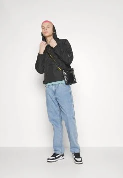 Puma Staple Anorak Jacket - Windbreaker - Black -Fashion clothing de25259e7cfe4b52bc52a45ea59de640