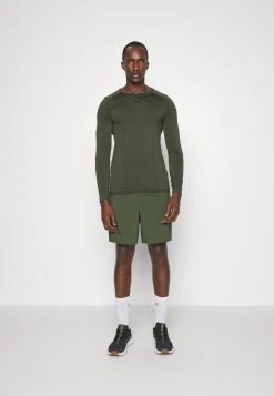 Puma Train Formknit Seamless Tee - Long Sleeved Top - Myrtle 14 Puma Train Formknit Seamless Tee - Long Sleeved Top - Myrtle -Fashion clothing e100f8cd322c4ef695ac0d13e2fdb391