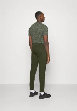 Puma Evostripe Dk - Tracksuit Bottoms - Myrtle -Fashion clothing e6e7658790cd416abcaa2edaf60941ba