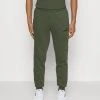 Puma Pants - Tracksuit Bottoms - Myrtle 1 Puma Pants - Tracksuit Bottoms - Myrtle -Fashion clothing fbcd2a22851748c387bf5c5aefcc5c75